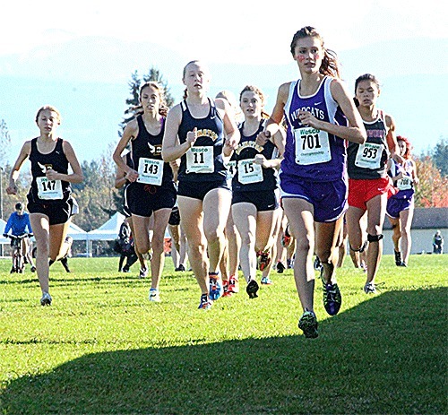 Oak Harbor's Jonalynn Horn (701) takes an early lead on the way to winning the Wesco North cross country title.