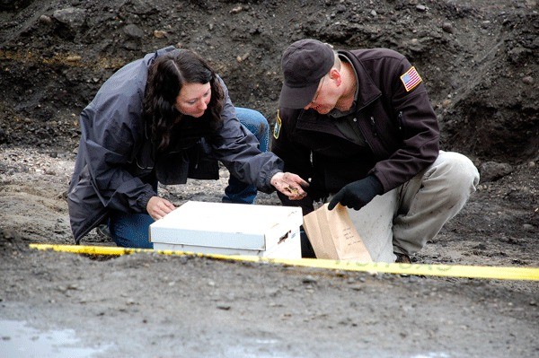 Assistant State Archeologist Gretchen Kaehler and Physical Anthropologist Guy Tasa