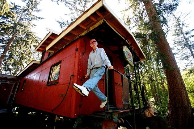 Jim Freeman shows off the caboose that he's lived in for three decades on Whidbey Island. Freeman