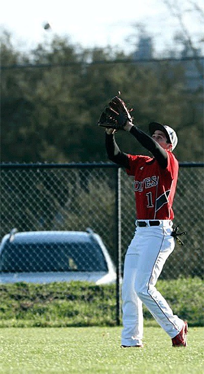 Coupeville centerfielder Kyle Bodamer catches a fly ball in Monday's game with Sultan.