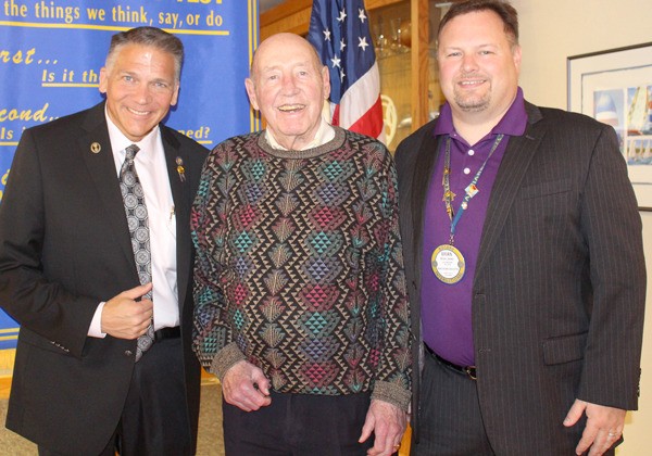 Al Koetje (center) was honored by Oak Harbor Rotary Club for 55 years of service and perfect attendance. He’s flanked by former mayor Scott Dudley (left) and club President Brian Jones (right).