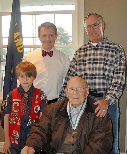 Four generations of the Allgire men were present at the breakfast honoring John Allgire for his service to scouting. The breakfast was at Frasers Gourmet Restaurant in Oak Harbor on Sept. 22. Seated is honoree John Allgire. From the left are his great-grandson
