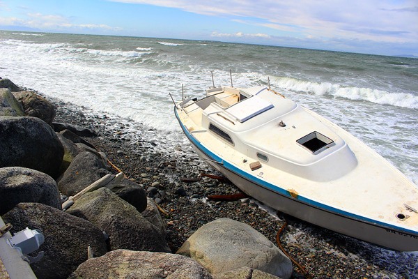 A sailboat trip to Port Townsend went badly Saturday when a man’s outboard motor failed. His boat was still washed up Tuesday on West Beach