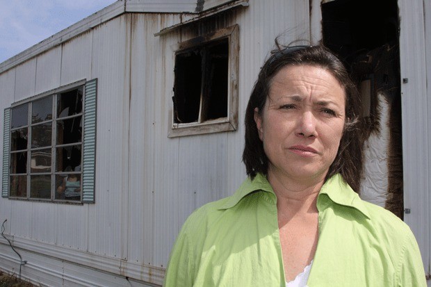 Sherry McWherter of Oak Harbor lost her mobile home and nearly all of her possessions to an electrical fire April 25. It is the second time she is faced with rebuilding her life.