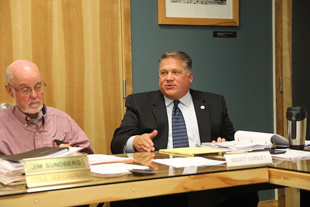 Oak Harbor Mayor Scott Dudley discusses issues during a recent Island Transit board meeting to review a state audit.