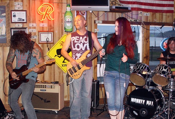 Monkey Hill performed a benefit concert Saturday evening at the Oak Harbor Tavern to raise money for Paul and Sally Burt.