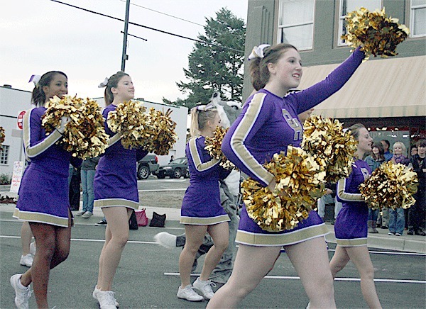 Oak Harbor High School Cheerleaders livened up the parade. Cheerleaders are