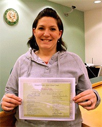 South Whidbey resident Monica Field receives a diploma from Island County adult drug court last week after two years of intense supervision and counseling.