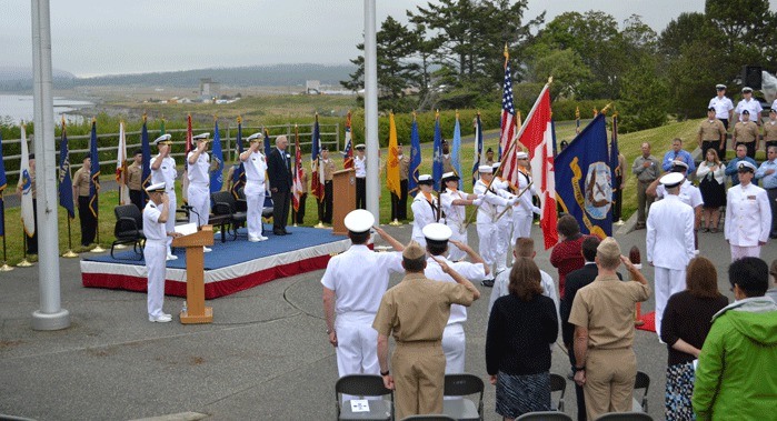 The colors are presented as the national anthems from Canada and the United States are played at the 25th anniversary ceremony for the Naval Ocean Processing Facility at NAS Whidbey Island.