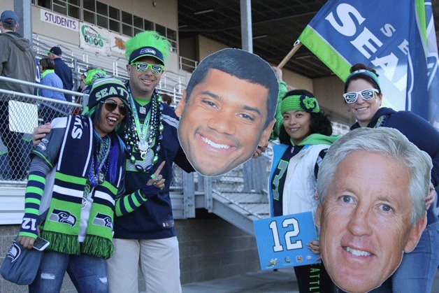 Seahawks fans celebrate at the 12th man rally at Oak Harbor High School Feb. 1