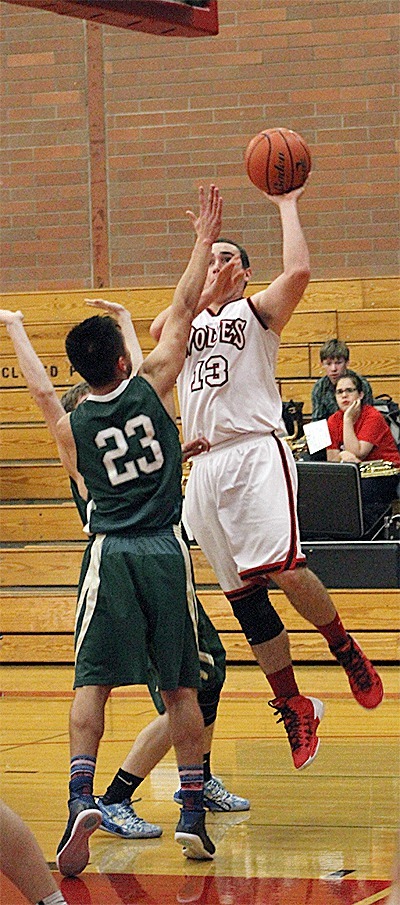 Aaron Trumbull flips in two of his team-high 13 points Friday.