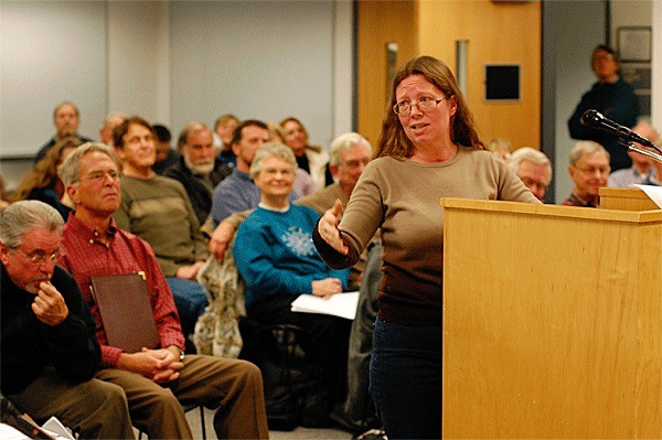 Oak Harbor resident Michelle Fealey speaks against a Clean Water Utility during a public hearing in Coupeville Monday. The Island County Board of Commissioners unanimously approved the utility.