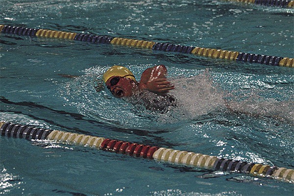 Nicole Vogt anchors Oak Harbor's winning 400 freestyle relay team Monday against Monroe.