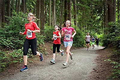 Runners weave through the woods in last year's Chum Run.