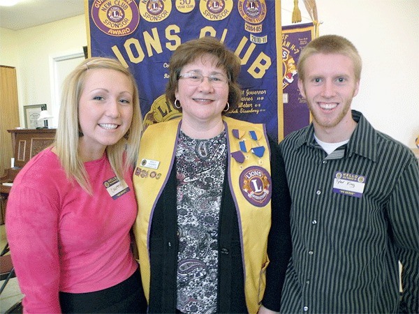 Coupeville High School seniors Courtney Arnold and Tyler King were chosen as the Coupeville Lions students of the quarter. They are pictured here with Molly Hughes
