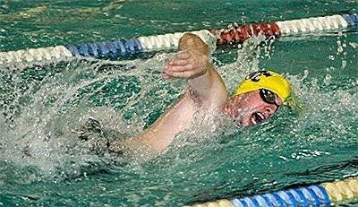Joe Gorman swims to first place in the 400-meter freestyle Monday. Gorman also won the 200 freestyle for the Wildcats.
