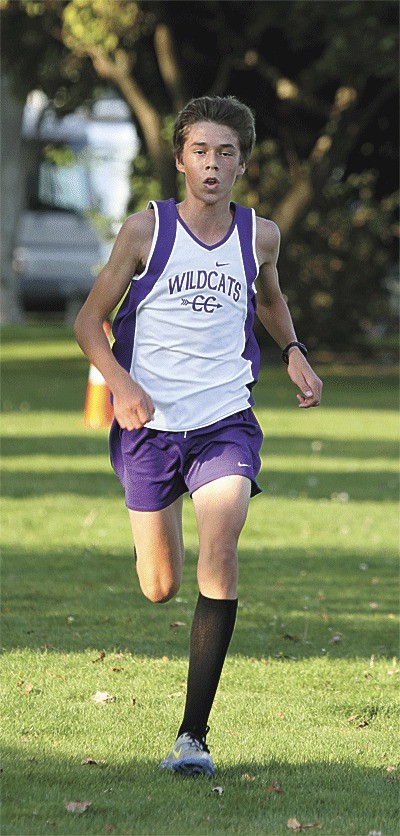John Rodeheffer finishes strong while winning the boys cross country race at Windjammer Park Thursday. Rodeheffer helped the Oak Harbor boys win the three-team meet.
