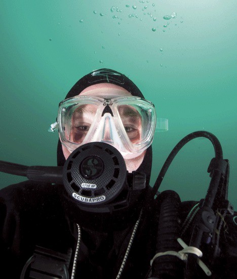 Undersea photographer John Gross snaps a self portrait underwater.