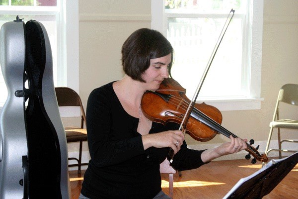Tekla Cunningham rehearses for the Whidbey Island Music Festival at the Greenbank Farm.