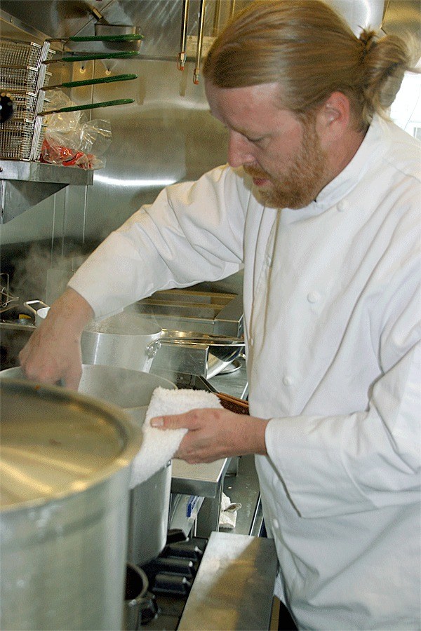 Chef Jerry Ritchie cooks in a tight kitchen of Coupeville’s newest restaurant