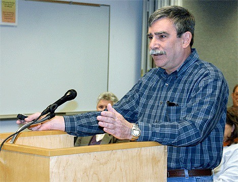 Central Whidbey resident Jeff Lauderdale argues against the septic inspection program required by the county during Monday’s Board of Health meeting in Coupeville.