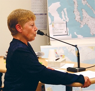 North Whidbey resident Becky Spraitzer argues her appeal before the members of the Western Washington Growth Management Hearings Board Thursday. She said Island County officials didn't adequately notify the community of a zoning ordinance.