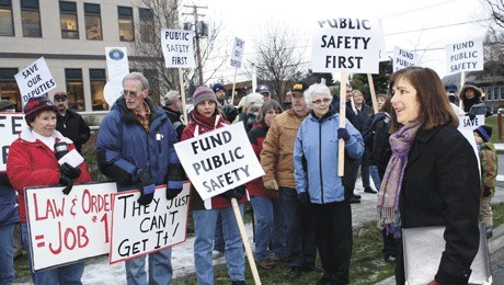 Island County Commissioner Helen Price Johnson addressed the picketers Monday morning.