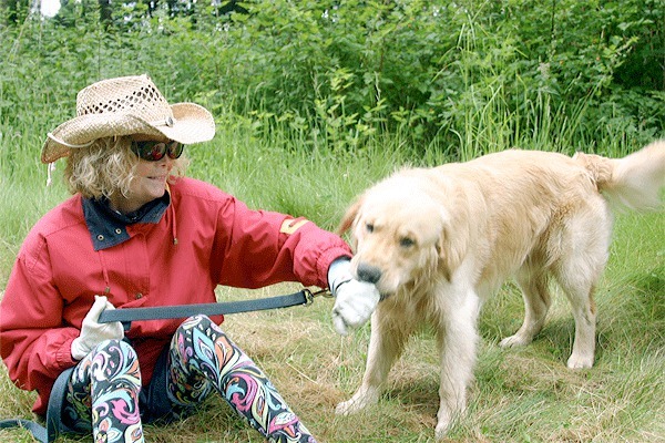 Central Whidbey resident Carolyn Brettman plays with Barney