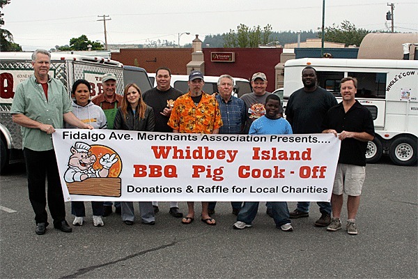 The best barbecue cooks on Whidbey Island will find out who prepares the best pork on Whidbey Island. From the left are Ron Apgar of Paint Your World