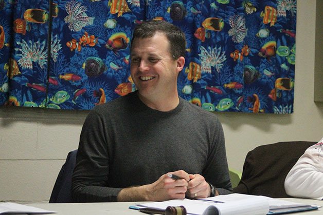 North Whidbey Park and Recreation District Commissioner Steve Hoffmire discusses concerns over the proposed contract for a new head coach for the district’s swim team at the special meeting Wednesday night.