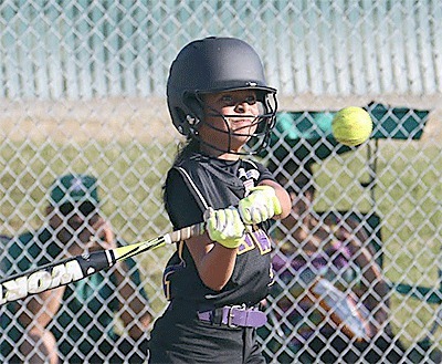 Macy Oliver attacks a pitch for North Whidbey in Tuesday's win.