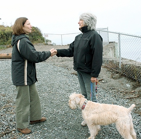 Island County Commissioner Angie Homola speaks with resident Marilyn Brownstein about the county’s new Adopt-A-Park program Thursday morning at Libbey Beach Park. Brownstein and her dog