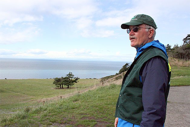 Washington State Parks volunteer Larry Doles explains his role as a trail monitor at Fort Ebey. Doles said in his four years volunteering for the park system