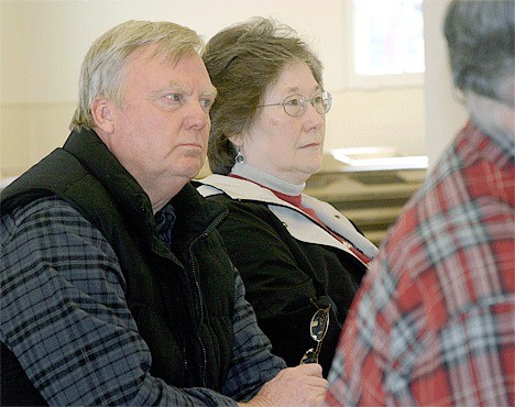 Mystic Sea owner Monte Hughes sits with Mary Alice Sterling during a Port of Coupeville Commissioner meeting Wednesday morning. He moved his whale watching tours from the Coupeville Wharf to La Conner.