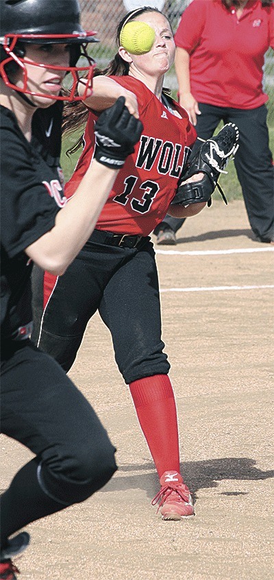 Coupeville pitcher McKalya Bailey fires to first after fielding a bunt to force out an Archbishop Murphy hitter.