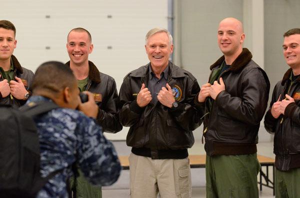 Secretary of the Navy Ray Mabus poses for a picture with personnel from Whidbey Island Naval Air Station during a visit to the airbase on Wednesday.