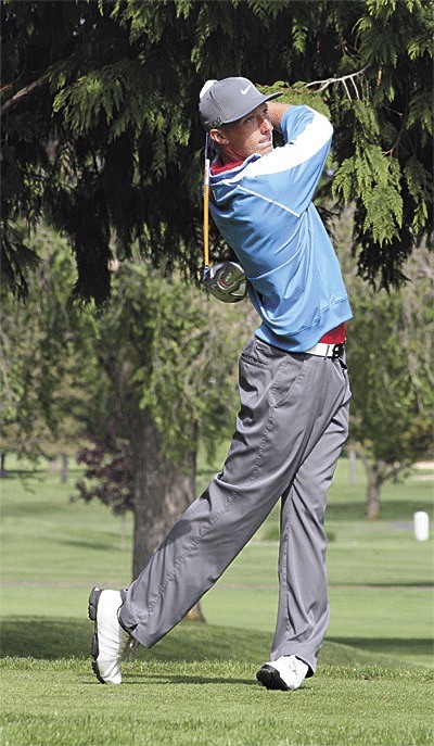 Eric McCardle tees off on the way to winning his fifth consecutive Whidbey Golf and Country Club Men's Invitational.
