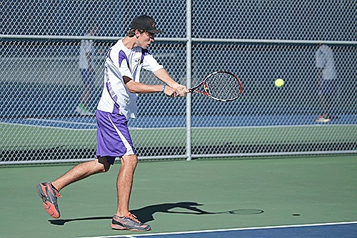 Jackson Wezeman returns a shot in Wednesday's match with Snohomish.