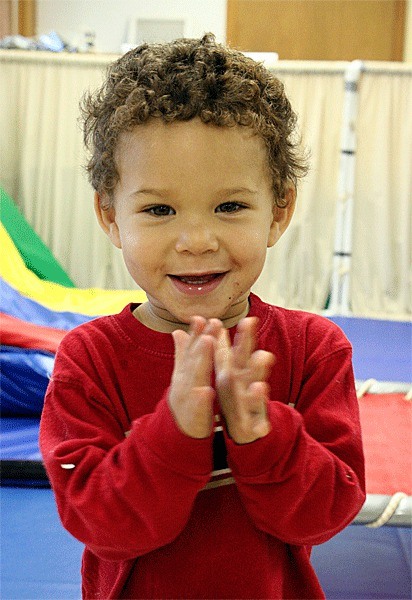 Two-year-old Ezra Jaramillo claps happily at the Toddler Learning Center in Oak Harbor. The center is one of United Way’s partner agencies for 2010. At the center children receive services such as occupational and physical therapys