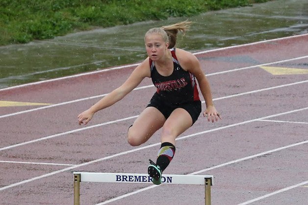 McKenzie Meyer runs to third place in the 300 hurdles.