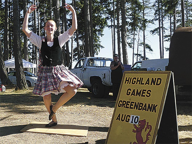 Oak Harbor resident Fionna Strong dances recently at the Oak Harbor Public Market. She was dancing to encourage people to attend the Highland Games