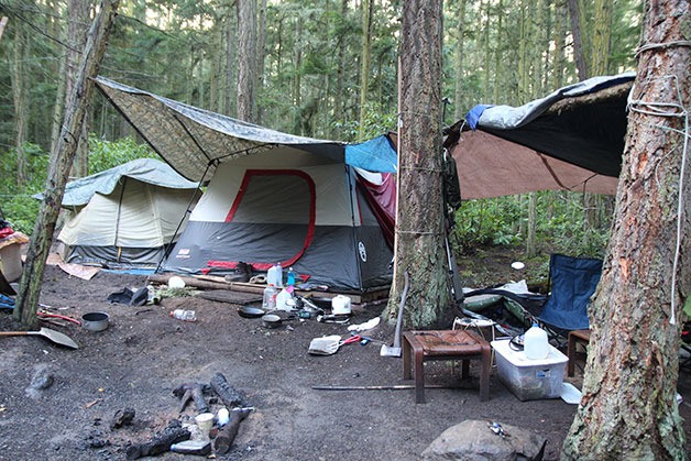 Nobody is home at a makeshift homeless camp in a Central Whidbey woods Monday afternoon. Island County officials are attempting to count the number of homeless in the county