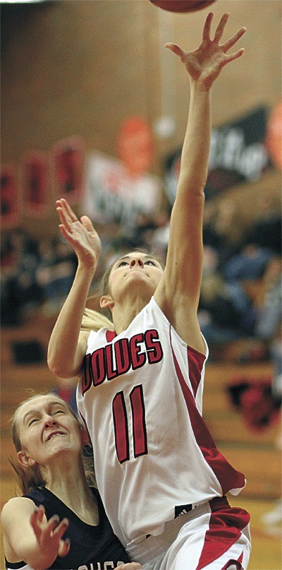 Cassidi Rosenkrance powers in for a layup against Nooksack Valley. The hoop was the final basket in the three-year starter's career for Coupeville.