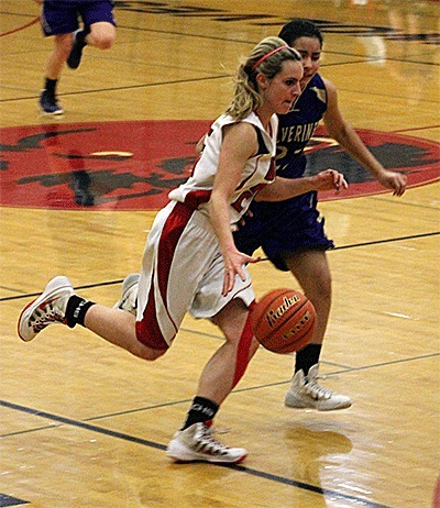 Wynter Thorne leads a fast break in the Wolves' loss Wednesday.