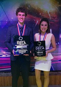 Nathan Young and Sasha Olson took home top awards in the national DECA competition in April.