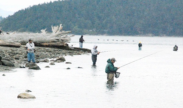Fishermen try for humpie salmon at Ala Spit. The popular county park will be closed for about six weeks beginning Monday for a restoration project that will remove rip-rap.