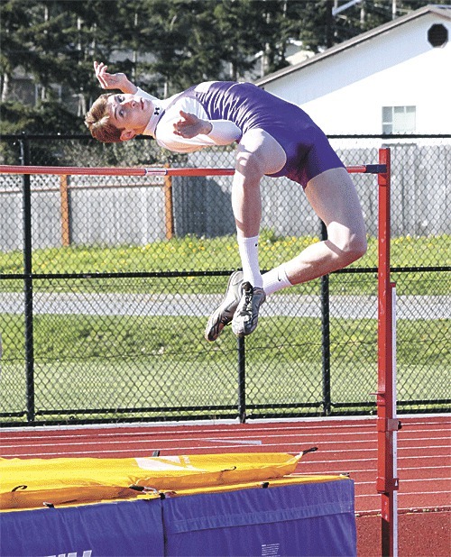 Chris Hailer clears 6-2 to win the high jump.