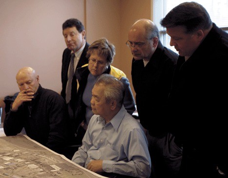 Oak Harbor City Council members review the latest plans for Pioneer Way at a committee meeting last week. The members