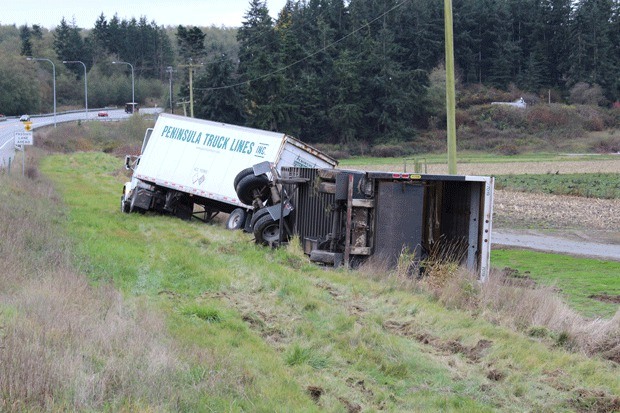 A semi truck crashed after leaving the highway in the Dugualla Bay area Thursday morning.