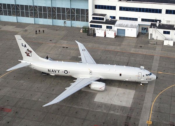 A P-8A Poseidon parks at Whidbey Island Naval Air Station during a visit last year. The base will receive 42 Poseidons starting in 2016.